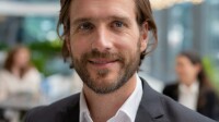 Firefly a corporate headshot of a man in his 40s in the international conference center in vienna 23.jpg