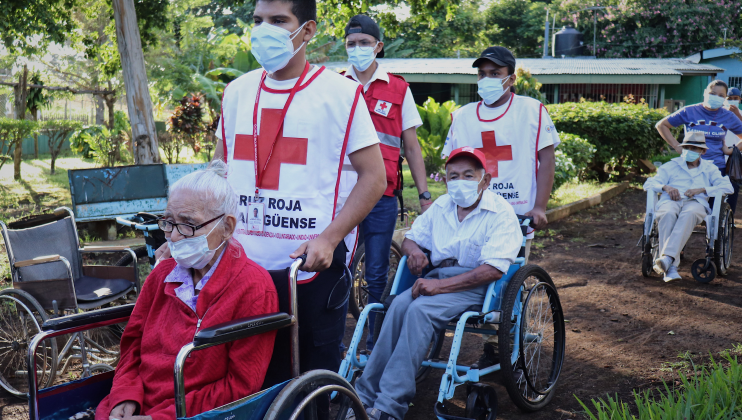 Nicaraguan Red Cross volunteers provide assistance to elders to facilitate their help them access COVID 19 vaccines. Credit Nicaraguan Red Cross